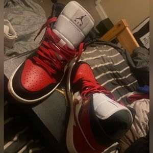 white black and red Jordan 1s